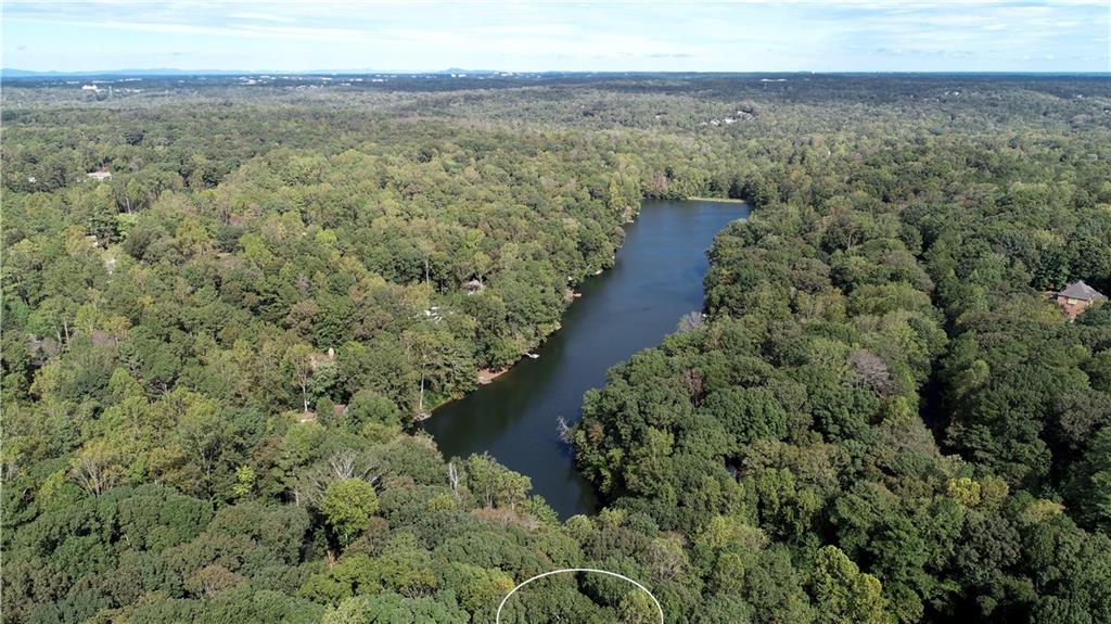 1630 Sunnybrook Farm Road Sandy Springs, GA 30350 - Photo 1 of 1 Perfectly private, wooded lot overlooking a lake.....doesn't get much better than that! Can you imagine coming home to this?