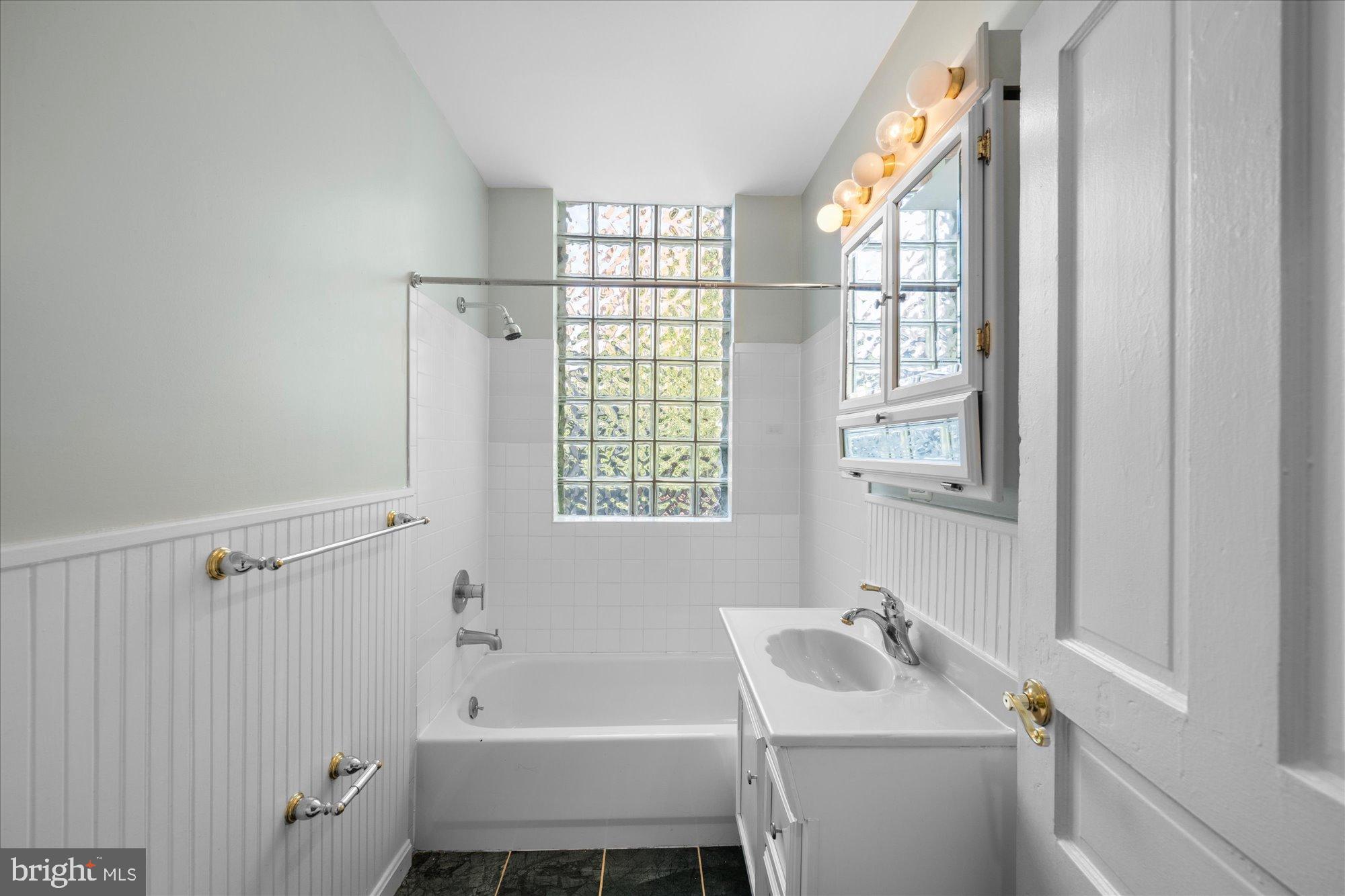 221 M Street Northwest Washington, DC 20001 - Photo 20 of 33 a bathroom with a sink toilet and shower
