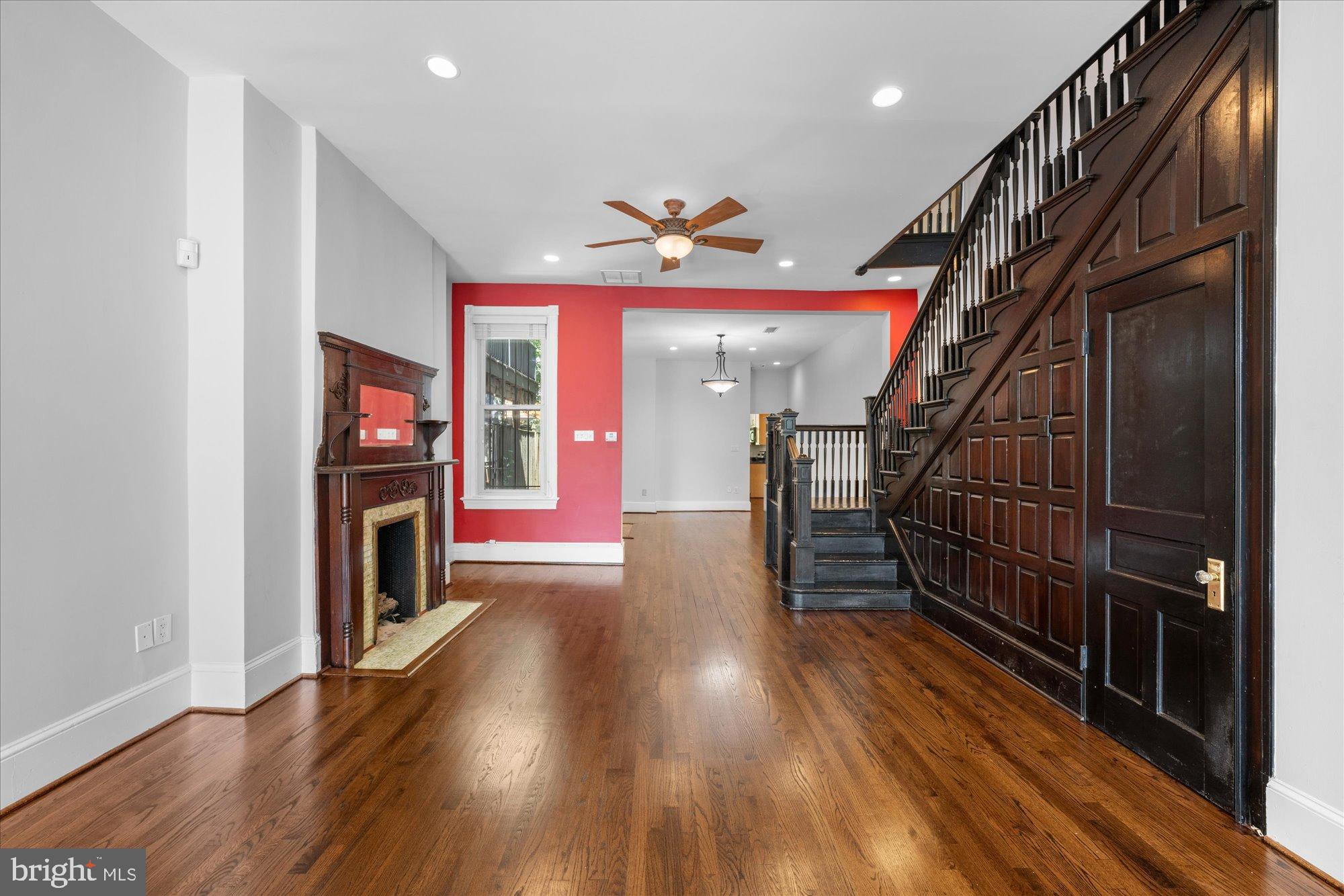221 M Street Northwest Washington, DC 20001 - Photo 8 of 33 a view of entryway livingroom and hall with wooden floor