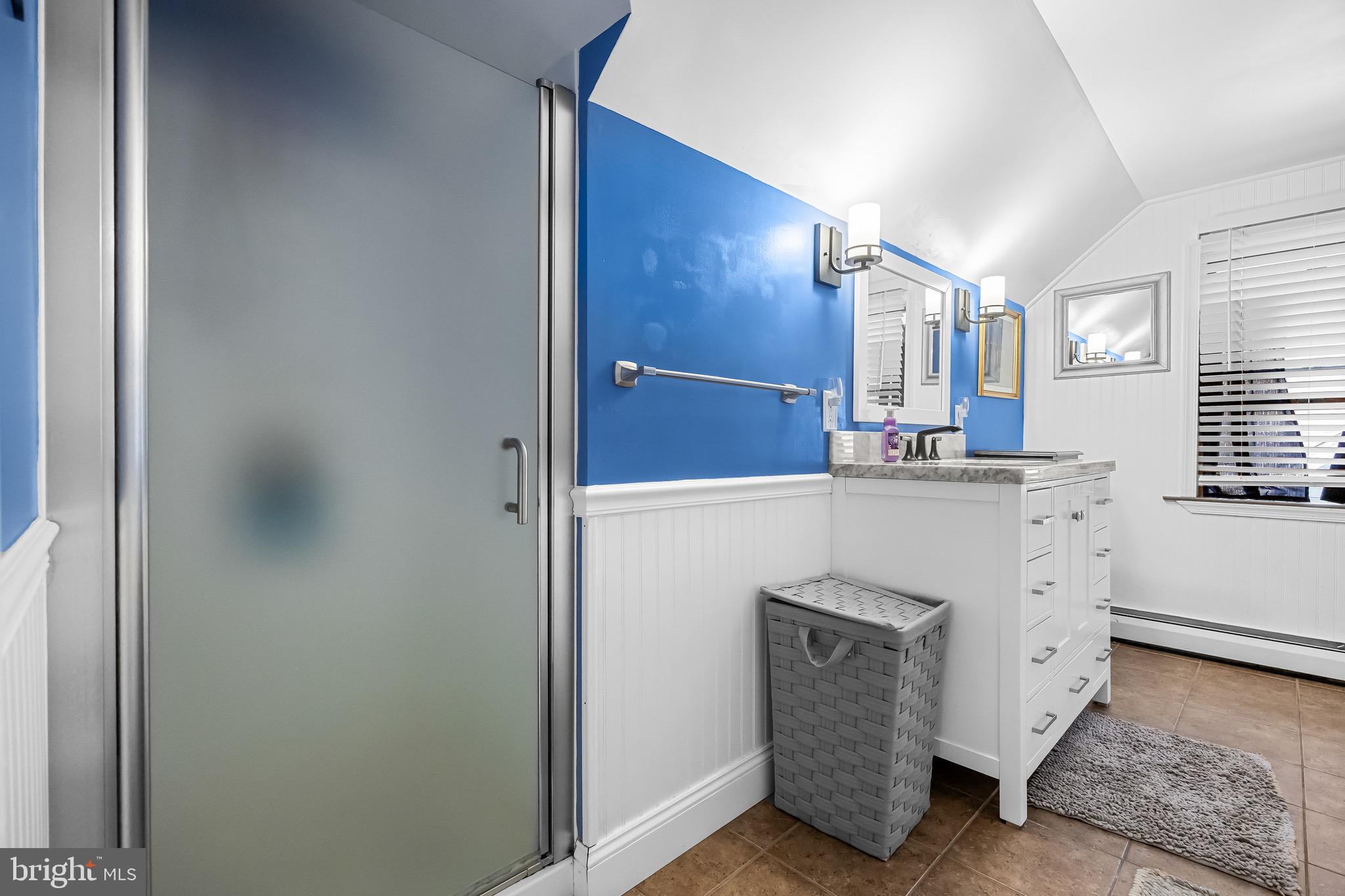 180 Cornell Road Audubon, NJ 08106 - Photo 29 of 38 a utility room with cabinets washer and dryer