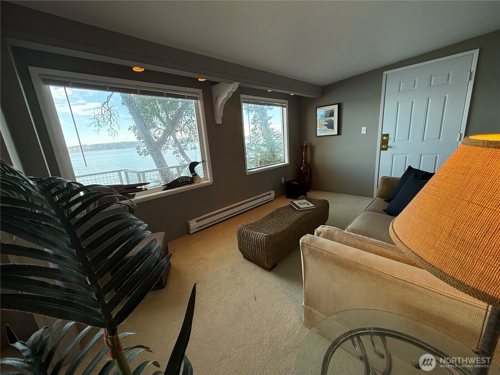 71 Seal Rock Road Brinnon, WA 98320 - Photo 12 of 22 a living room with furniture and a flat screen tv
