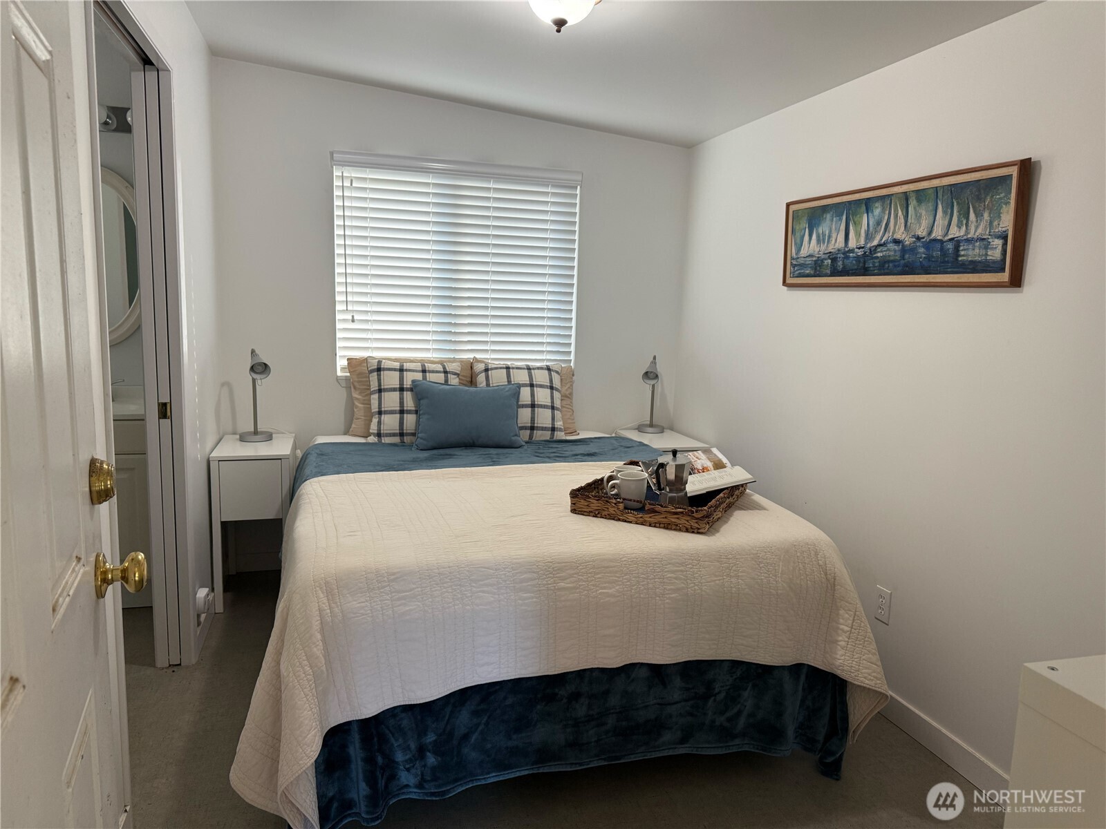 71 Seal Rock Road Brinnon, WA 98320 - Photo 14 of 22 a bedroom with a bed and a window