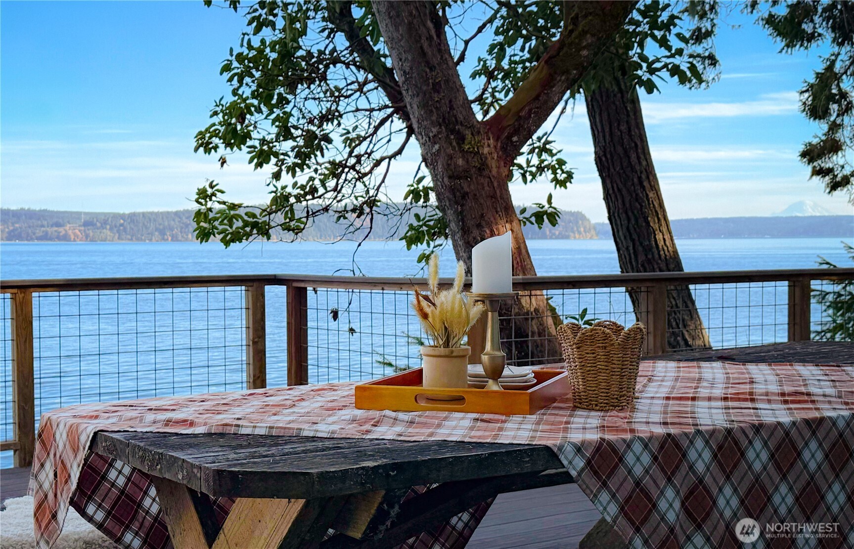 71 Seal Rock Road Brinnon, WA 98320 - Photo 3 of 22 a view of balcony with wooden floor and fence