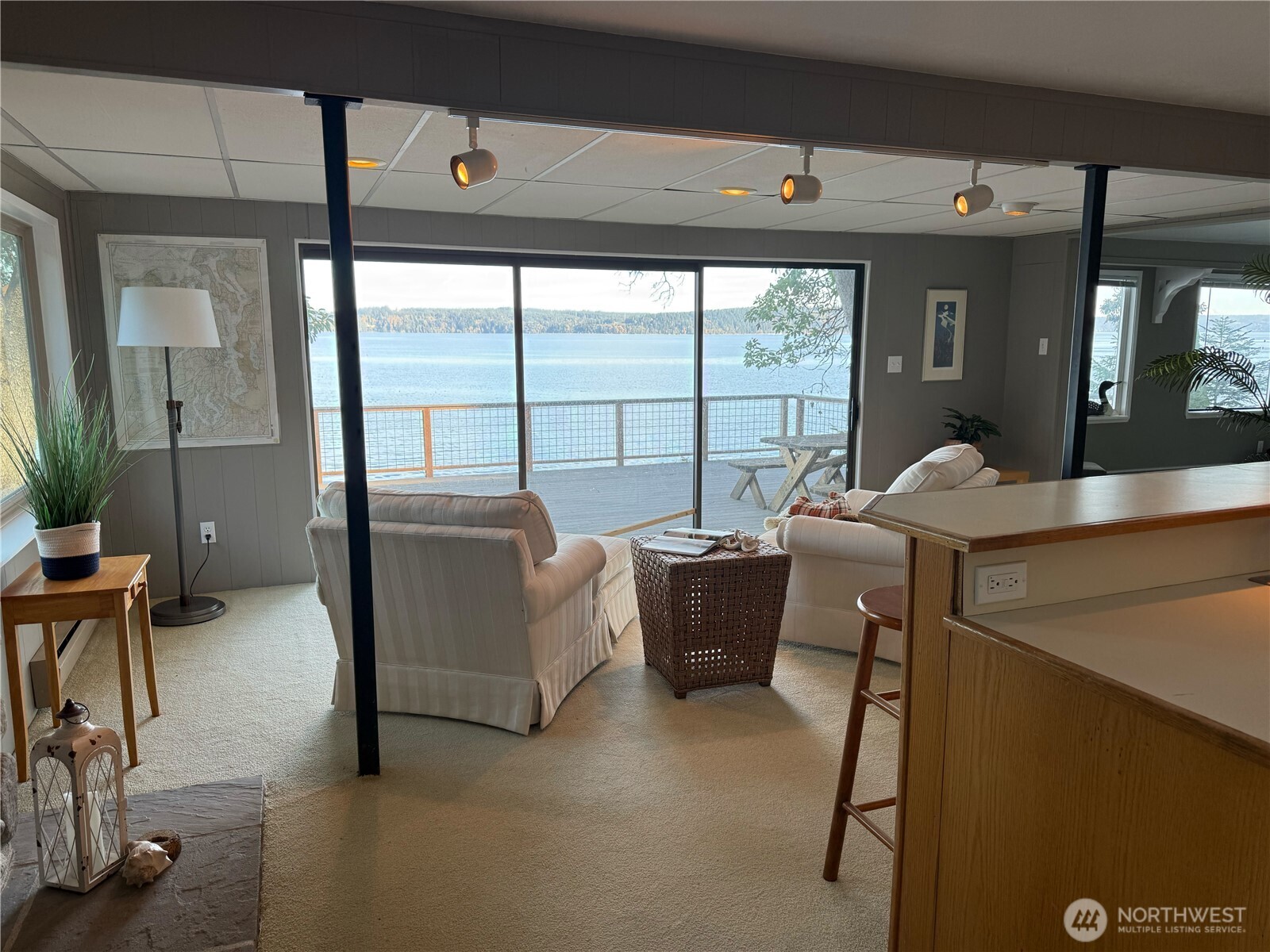 71 Seal Rock Road Brinnon, WA 98320 - Photo 4 of 22 a living room with furniture and a large window