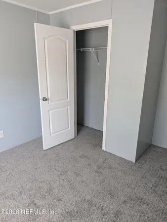 an empty room with closet