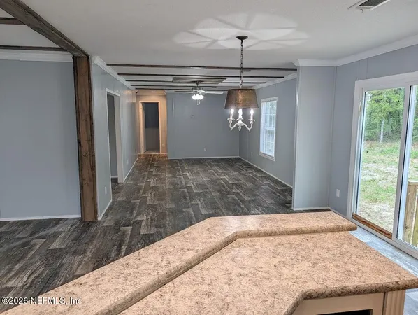 a view of a livingroom with a chandelier