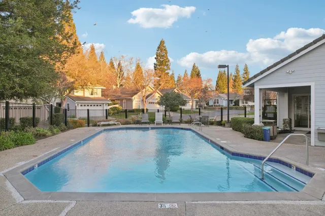 a view of a house with swimming pool