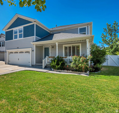 546 Wheatridge Road Tooele, UT 84074 - Photo 4 of 49 Covered porch