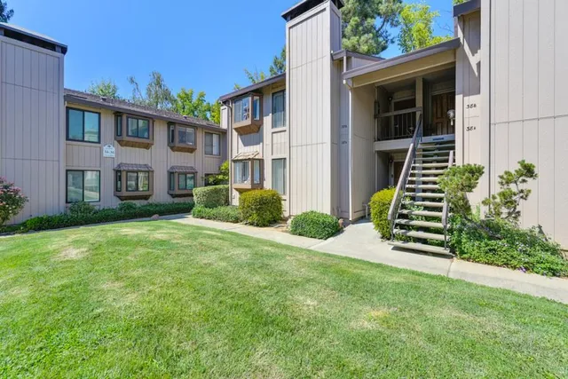 a house view with a garden space