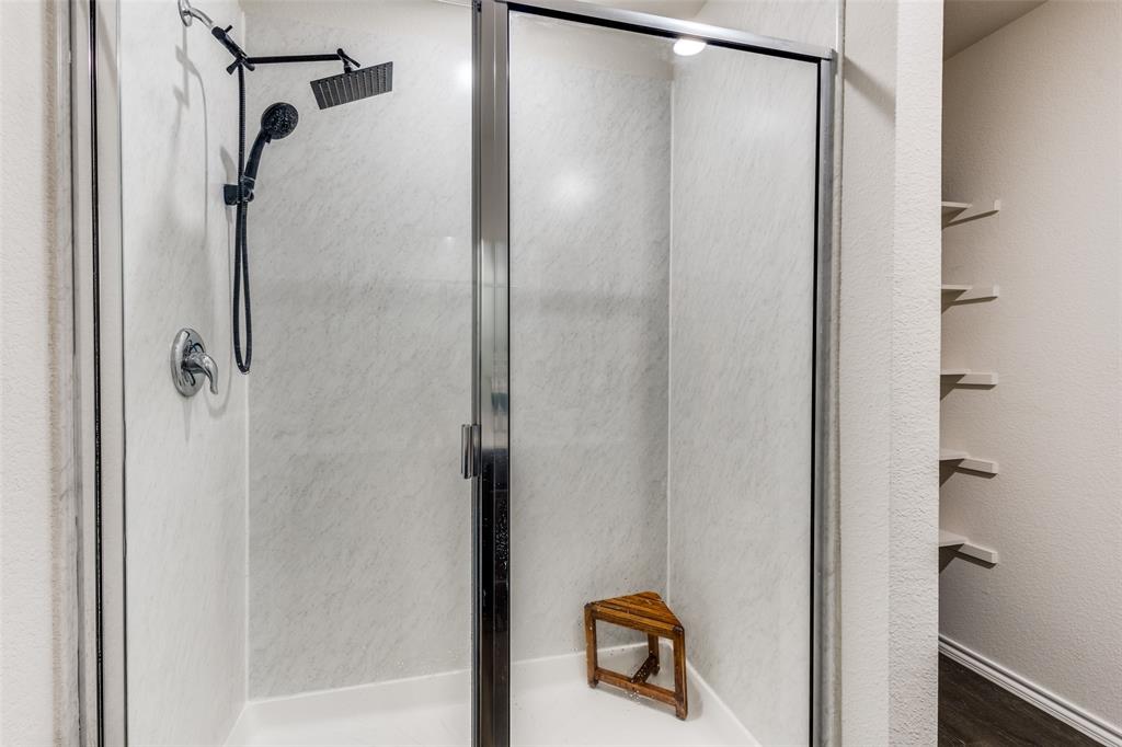 305 Ginger Avenue Anna, TX 75409 - Photo 15 of 28 a bathroom with a shower