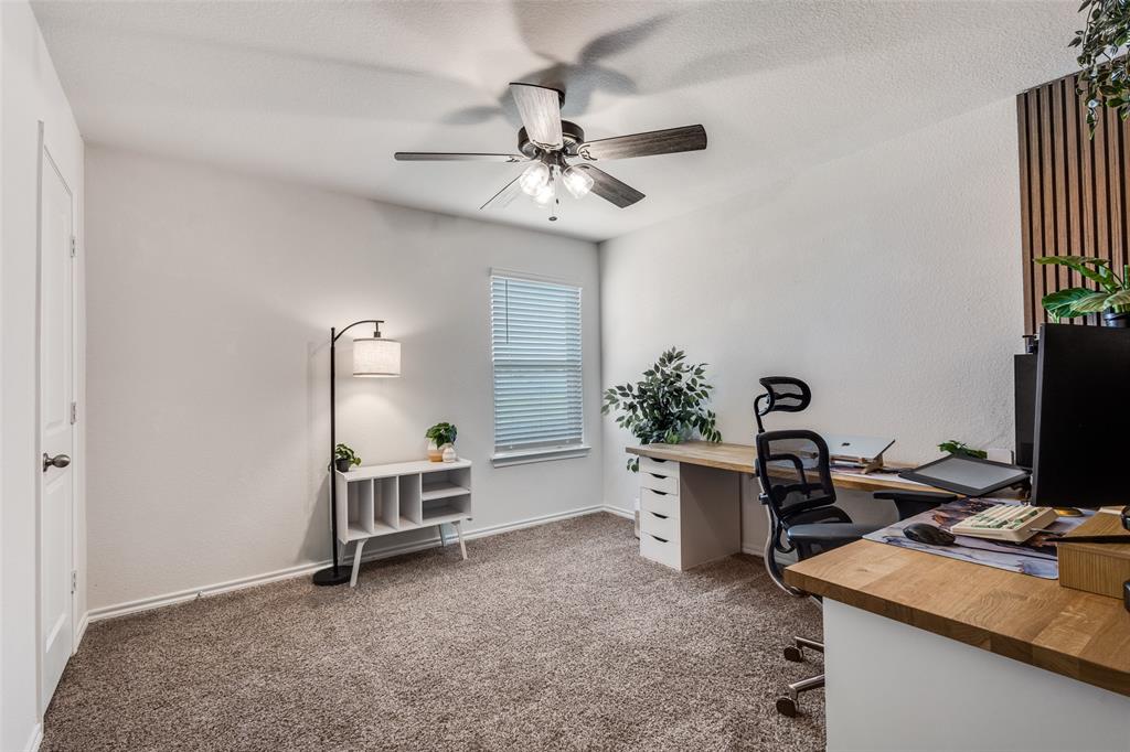305 Ginger Avenue Anna, TX 75409 - Photo 20 of 28 a view of a workspace with furniture and a window