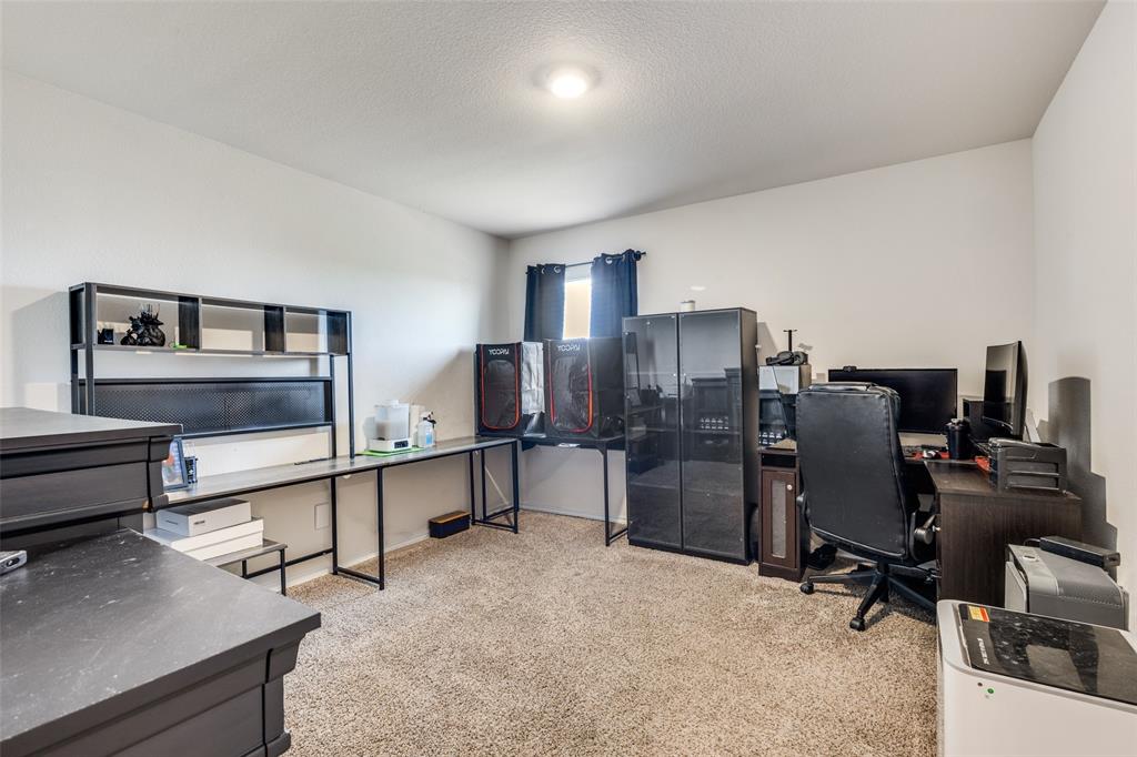 305 Ginger Avenue Anna, TX 75409 - Photo 22 of 28 a view of a workspace with furniture