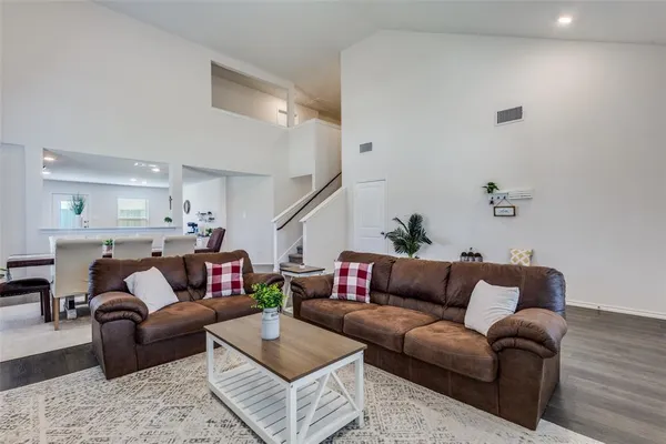 a living room with furniture and a couch