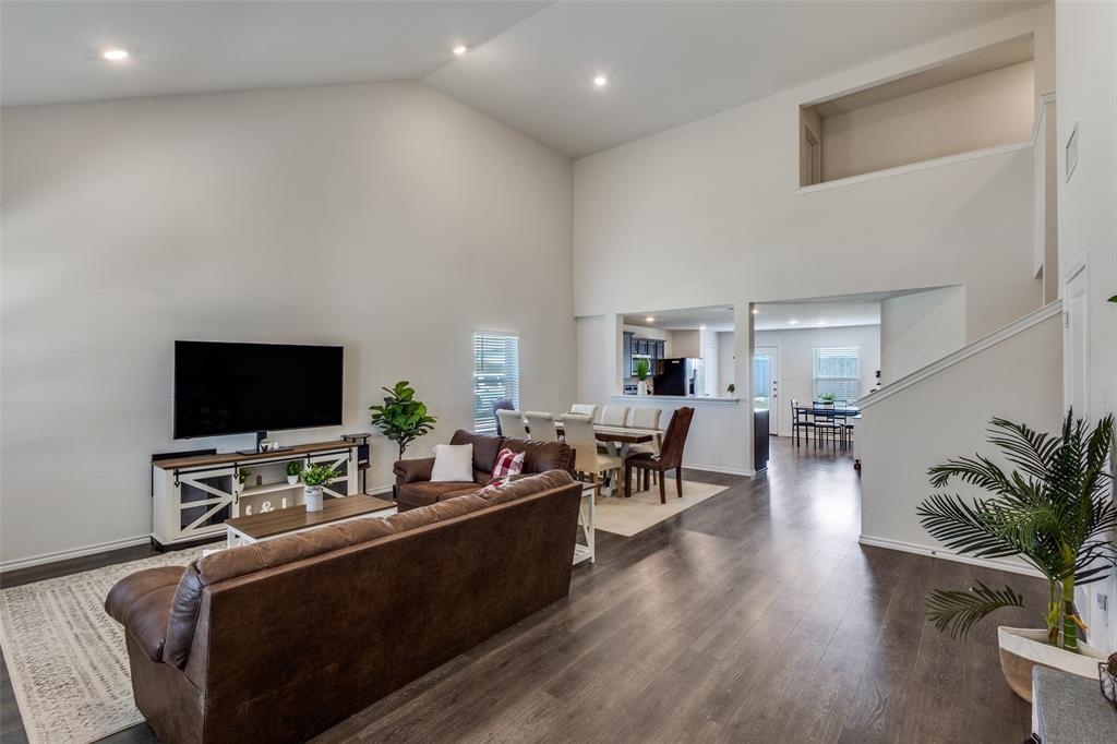 305 Ginger Avenue Anna, TX 75409 - Photo 6 of 28 a living room with furniture and a flat screen tv