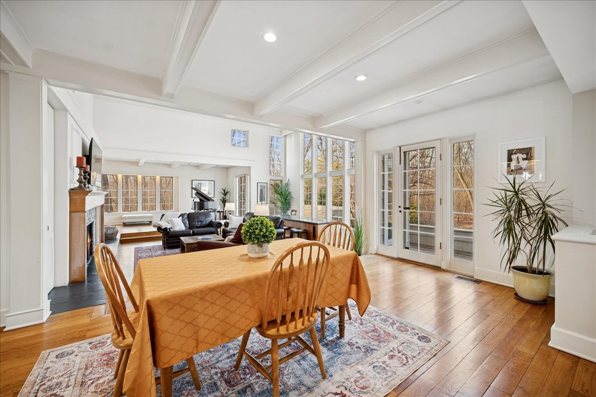 2085 Stirling Road Bannockburn, IL 60015 - Photo 14 of 48 a view of a dining room with furniture window and wooden floor