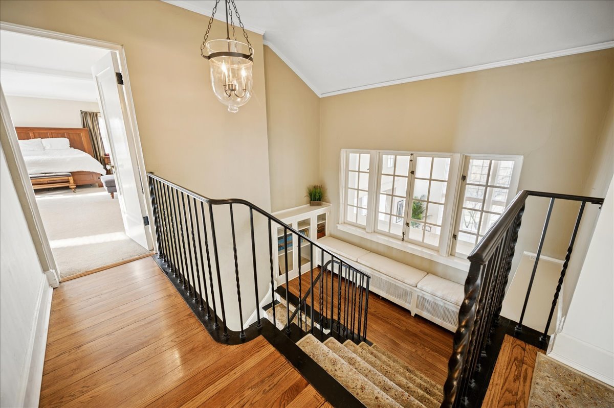 2085 Stirling Road Bannockburn, IL 60015 - Photo 21 of 48 a view of a hallway with wooden floor and stairs