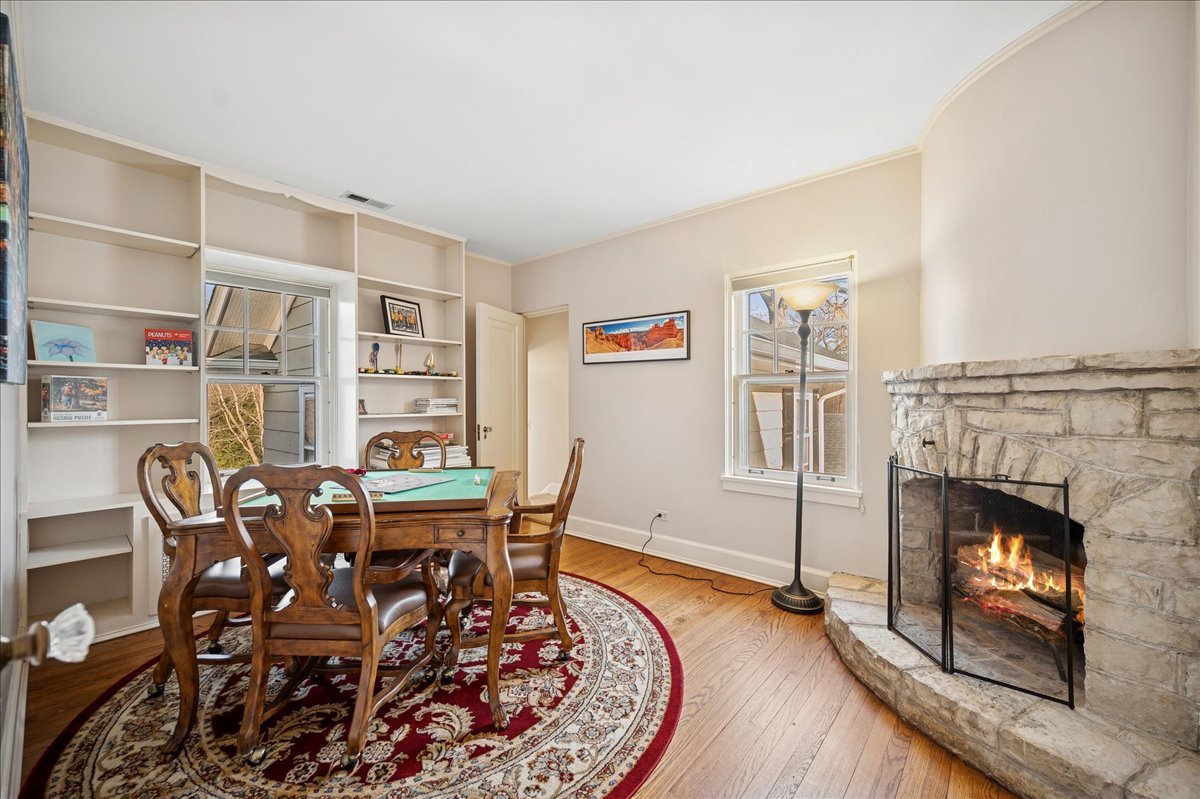 2085 Stirling Road Bannockburn, IL 60015 - Photo 27 of 48 a view of a livingroom with furniture and a fireplace