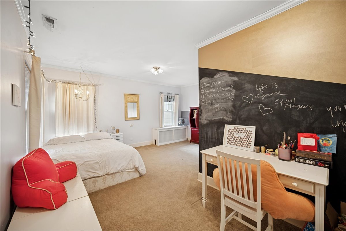 2085 Stirling Road Bannockburn, IL 60015 - Photo 29 of 48 a bedroom with furniture and a flat screen tv