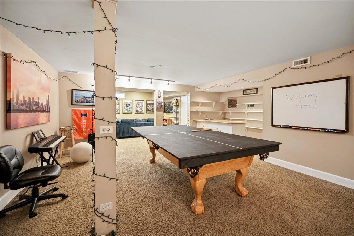 2085 Stirling Road Bannockburn, IL 60015 - Photo 35 of 48 a room with furniture pool table and windows