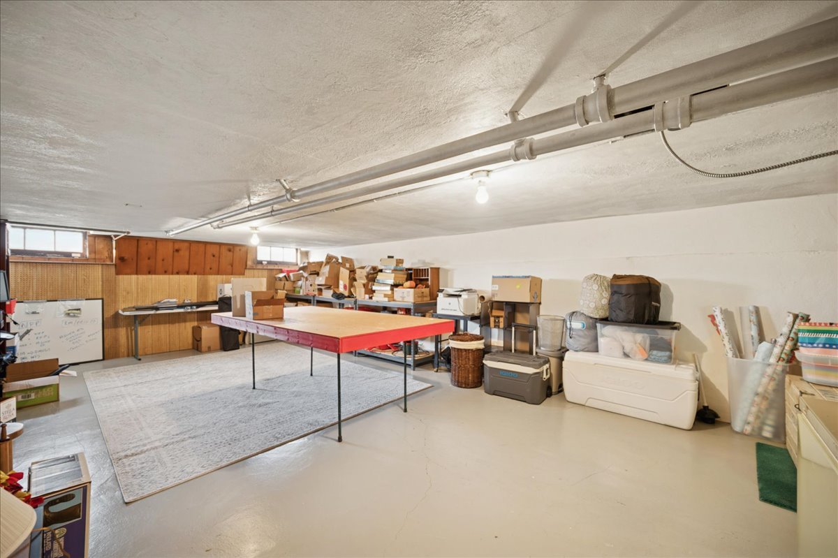 2085 Stirling Road Bannockburn, IL 60015 - Photo 36 of 48 a living room with furniture and a table