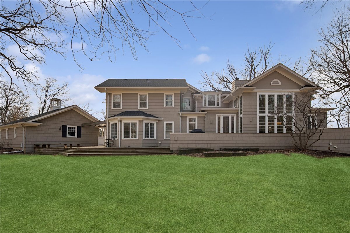 2085 Stirling Road Bannockburn, IL 60015 - Photo 38 of 48 a front view of a house with a garden