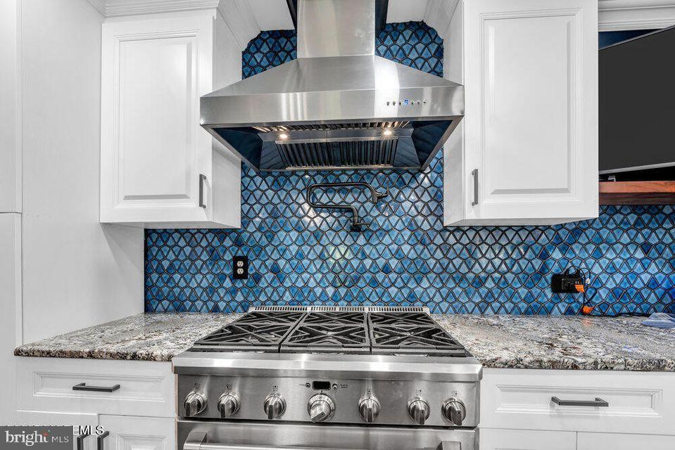 225 West Bird Village Road Jackson, NJ 08527 - Photo 23 of 66 a stove top oven sitting inside of a kitchen