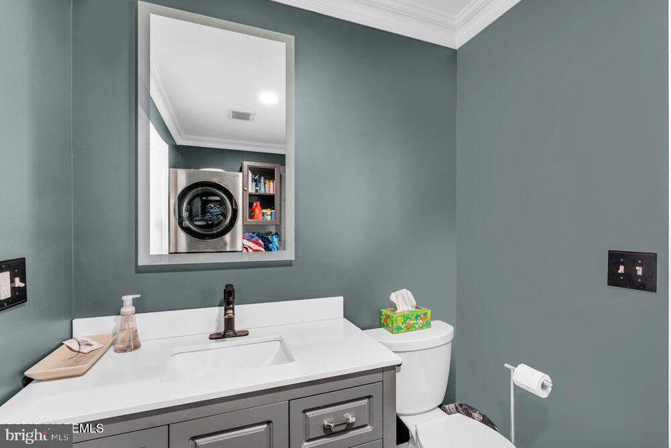 225 West Bird Village Road Jackson, NJ 08527 - Photo 26 of 66 a bathroom with a sink a toilet and vanity