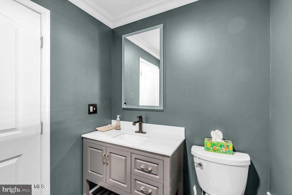 225 West Bird Village Road Jackson, NJ 08527 - Photo 27 of 66 a bathroom with a sink a toilet and a mirror