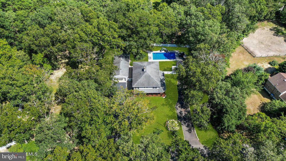 225 West Bird Village Road Jackson, NJ 08527 - Photo 3 of 66 an aerial view of a house with a yard