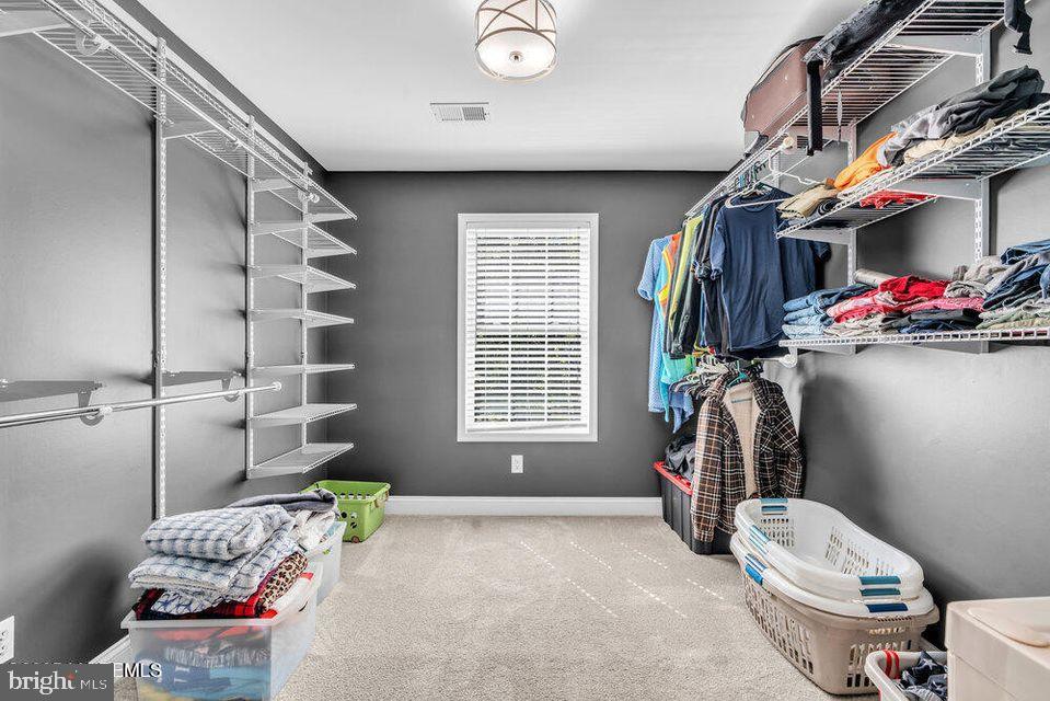 225 West Bird Village Road Jackson, NJ 08527 - Photo 31 of 66 a bedroom with a bed and a window