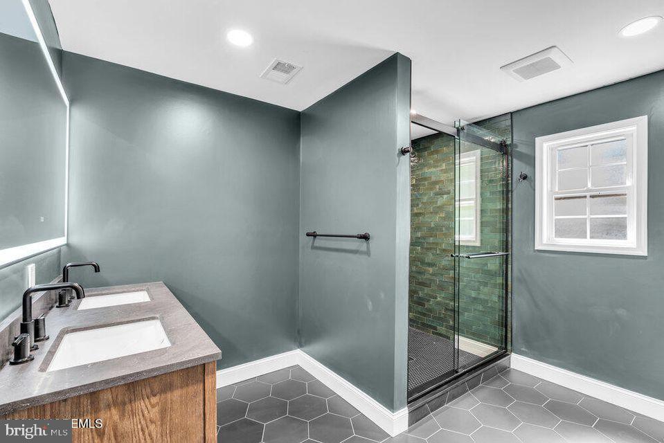 225 West Bird Village Road Jackson, NJ 08527 - Photo 32 of 66 a bathroom with a sink a toilet and shower