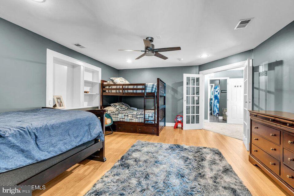 225 West Bird Village Road Jackson, NJ 08527 - Photo 35 of 66 a bed room with a bed and a television