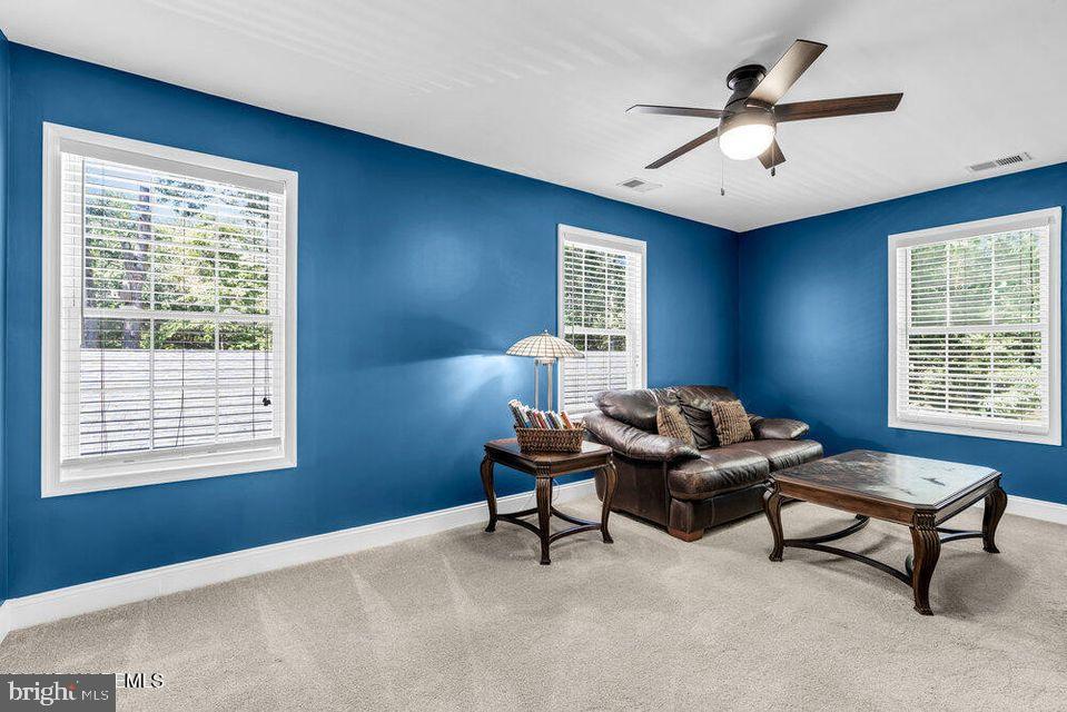 225 West Bird Village Road Jackson, NJ 08527 - Photo 39 of 66 a living room with furniture and windows