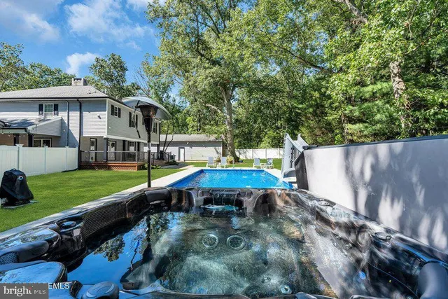 a garden view with a sitting area