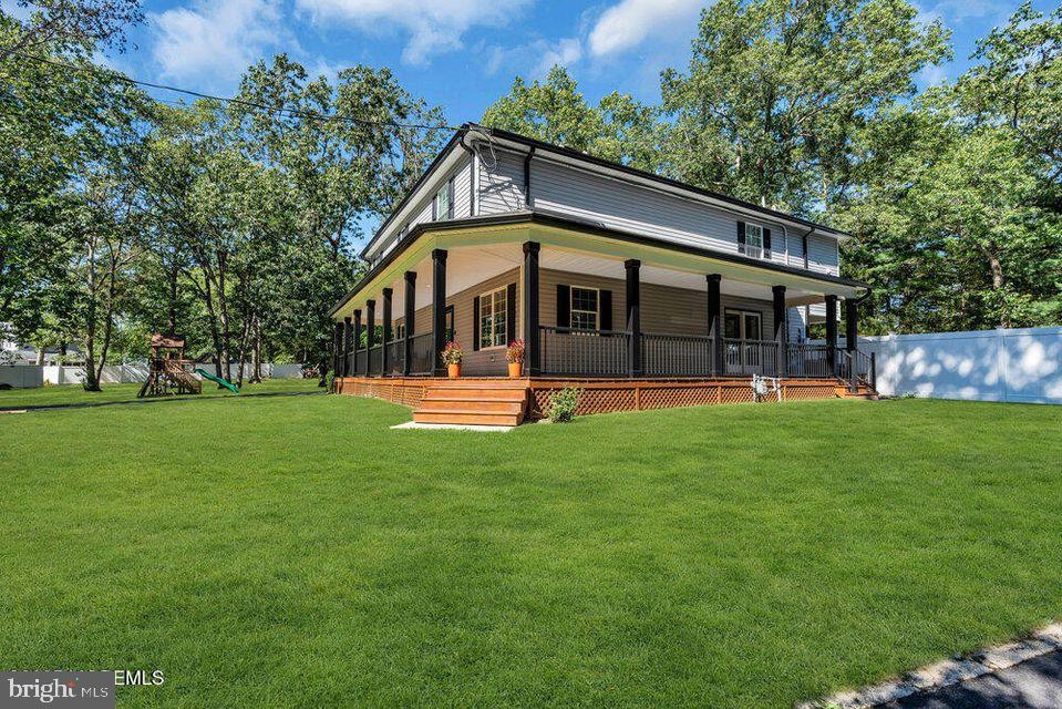 225 West Bird Village Road Jackson, NJ 08527 - Photo 8 of 66 a view of a house with a yard