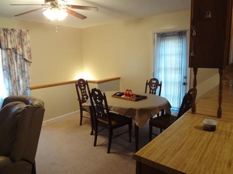706 Center Point Road Pulaski, TN 38478 - Photo 8 of 20 a view of a dining room with furniture and chandelier
