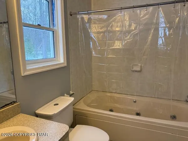 a view of a room with an empty space