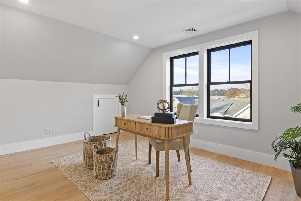 10 Webber Avenue, Unit 201 Bedford, MA 01730 - Photo 19 of 35 a workspace with furniture and window