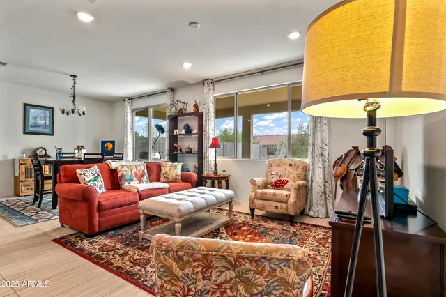 a living room with furniture and a table