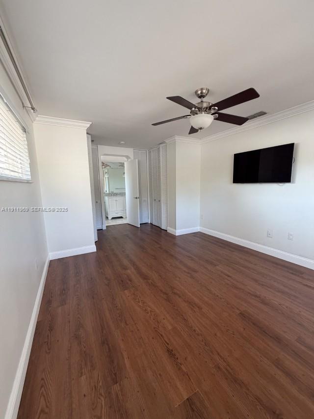 2224 Tinker Street Port Charlotte, FL 33948 - Photo 13 of 42 wooden floor in an empty room with a window