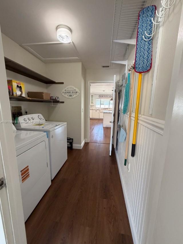 2224 Tinker Street Port Charlotte, FL 33948 - Photo 27 of 42 a view of walk in closet with clothes and shoes