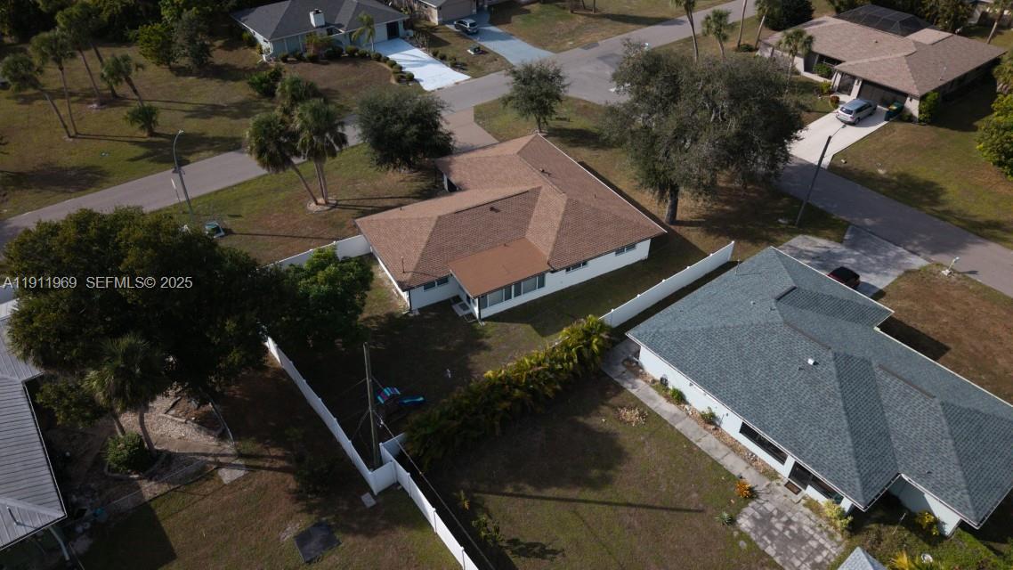 2224 Tinker Street Port Charlotte, FL 33948 - Photo 37 of 42 an aerial view of house with a yard