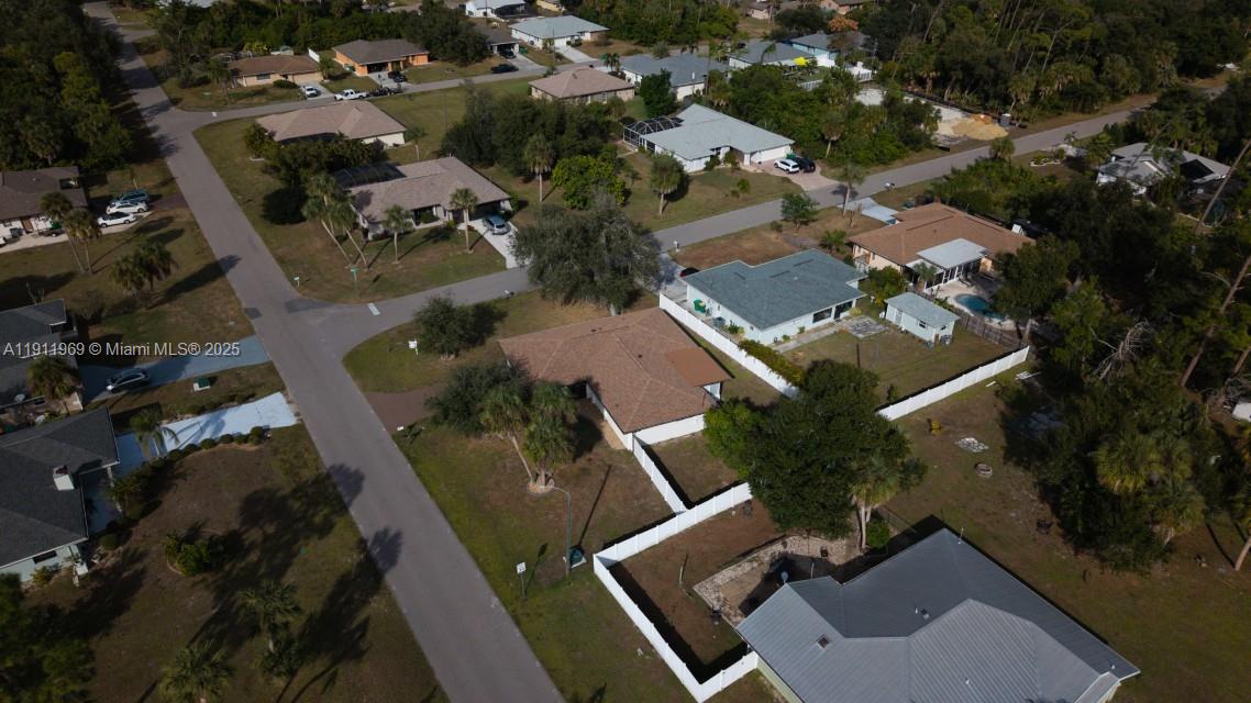 2224 Tinker Street Port Charlotte, FL 33948 - Photo 42 of 42 an aerial view of a house with a yard
