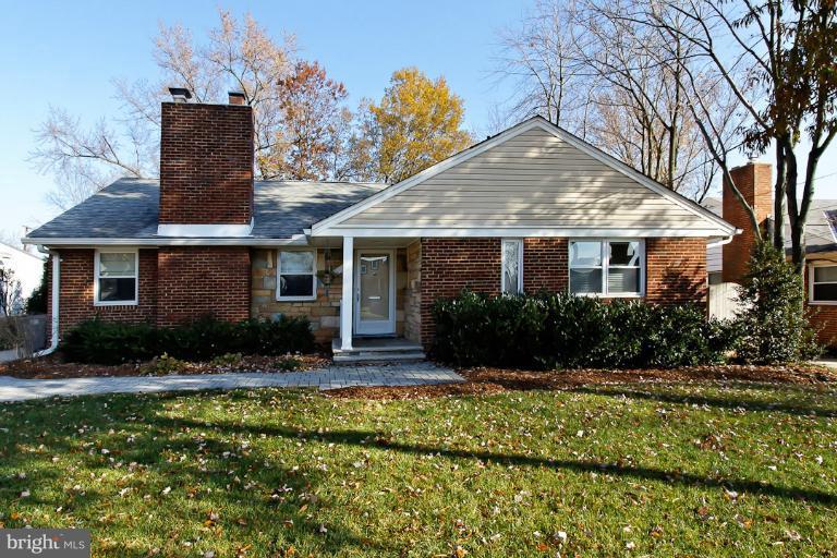 9709 Saxony Road Silver Spring, MD 20910 - Photo 1 of 24 a front view of a house with garden