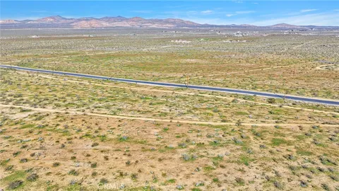 a view of an ocean and a mountain
