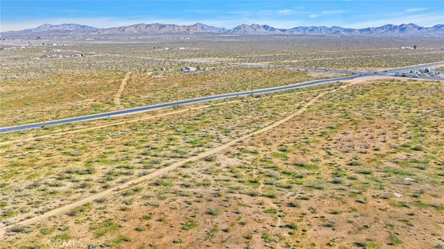 a view of an ocean and a mountain