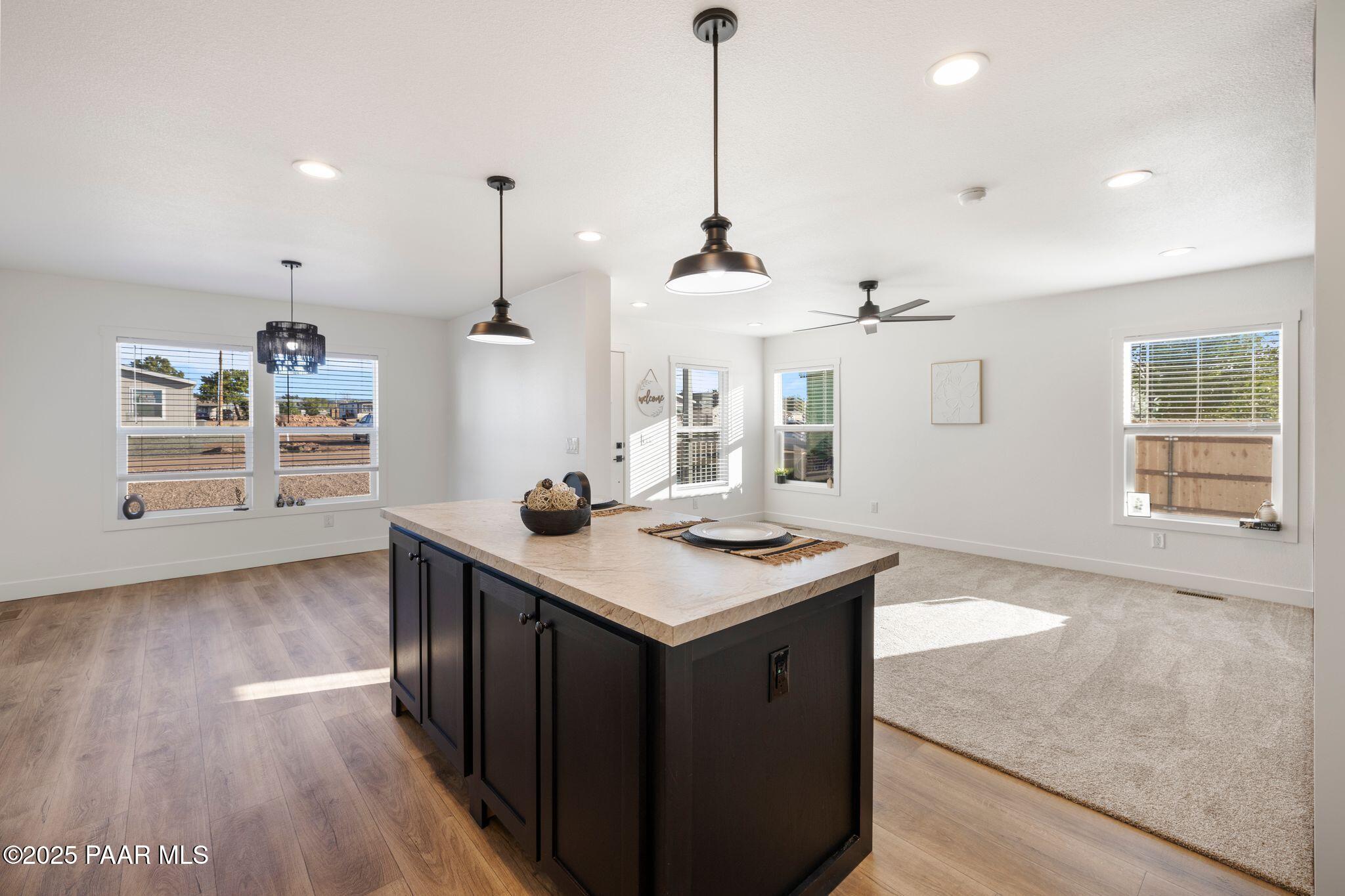 375 West Venice Way Paulden, AZ 86334 - Photo 12 of 41 a kitchen that has a sink a stove and wooden floor