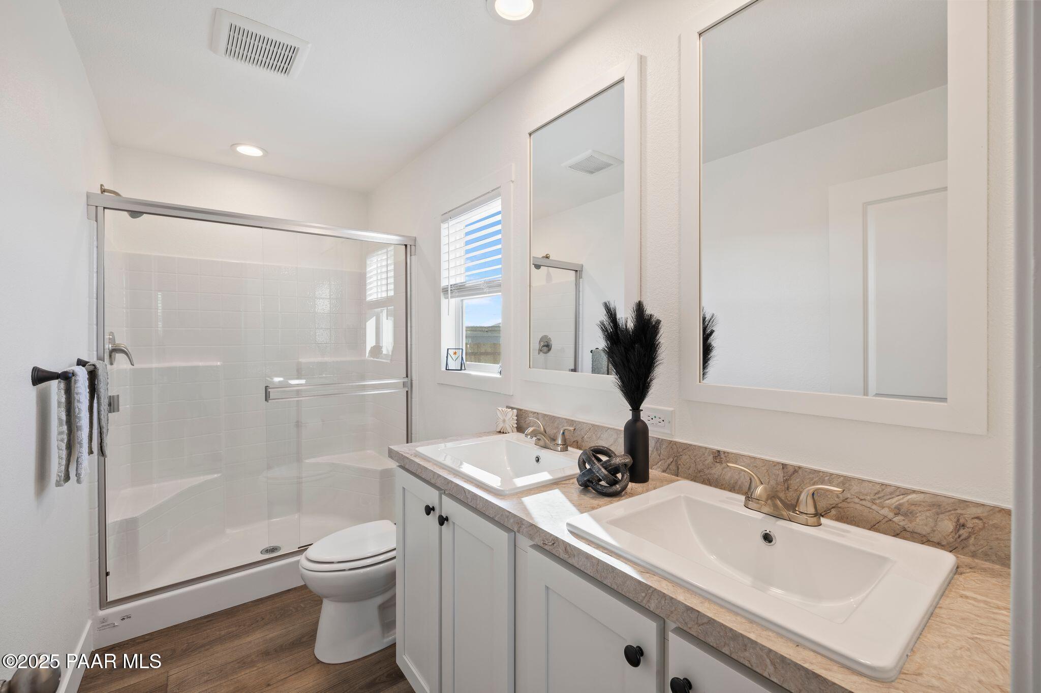 375 West Venice Way Paulden, AZ 86334 - Photo 27 of 41 a bathroom with a toilet sink and mirror