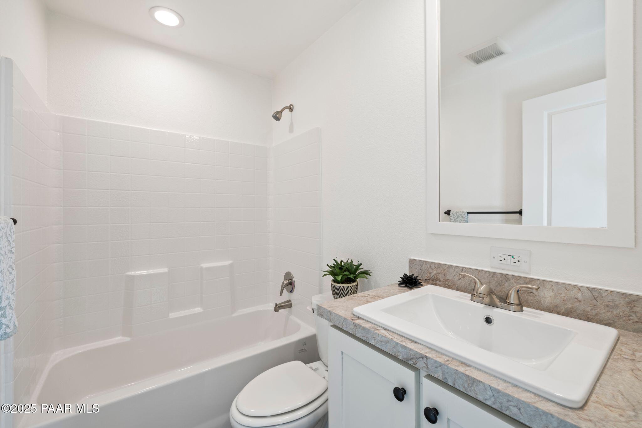 375 West Venice Way Paulden, AZ 86334 - Photo 31 of 41 a bathroom with a sink a toilet and bathtub