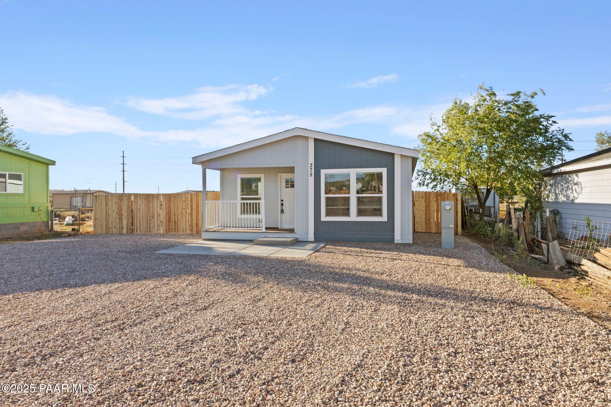 375 West Venice Way Paulden, AZ 86334 - Photo 4 of 41 a view of a house with a yard and garage